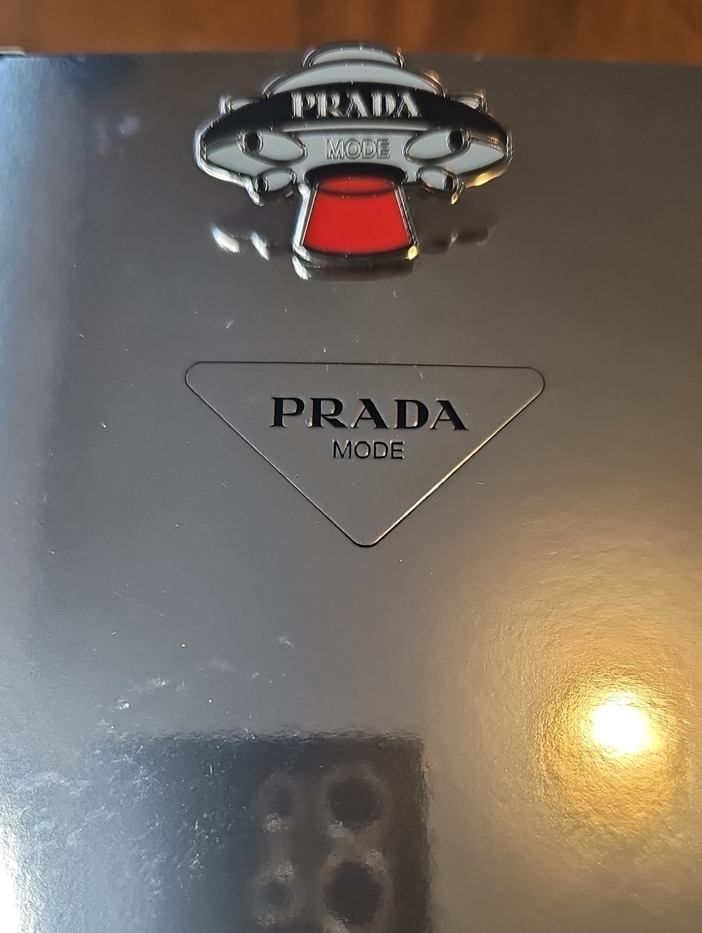 Prada UFO Pin with Red Enamel Accent